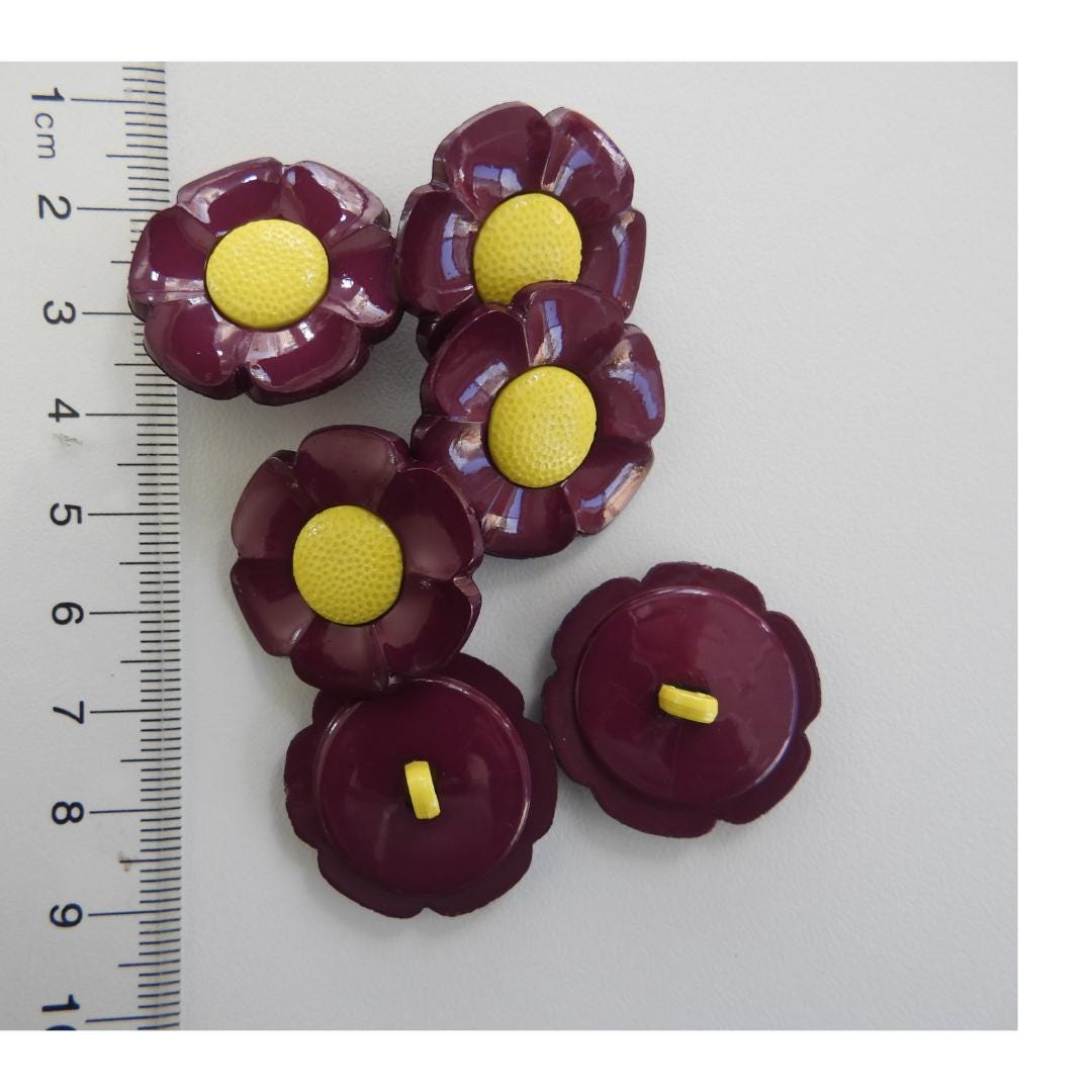 Funky 1970s-inspired flower buttons made of durable nylon. Set of 6 with burgundy petals, mustard yellow center. For sewing or crafts, 20 mm