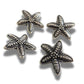 Set of 4 starfish-shaped 20mm metal buttons with a textured finish and shank back - for clothes, coats, crafts, and nautical-themed projects