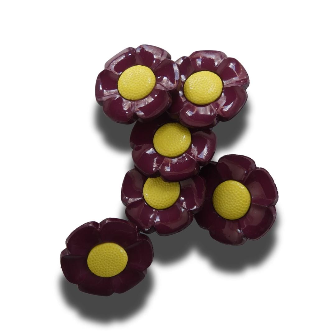 Funky 1970s-inspired flower buttons made of durable nylon. Set of 6 with burgundy petals, mustard yellow center. For sewing or crafts, 20 mm