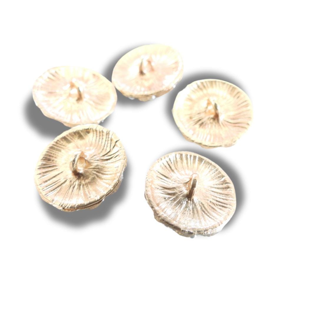 Chic black and gold buttons with tiny pearls—Nice for decorating blouses, sweaters, cardigans, shoes. A fancy touch for any sewing project!