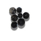 Set of 7 antique Victorian black glass buttons for sewing - 2-hole, 8–15 mm, Czech molded glass. Glossy floral & geometric patterns