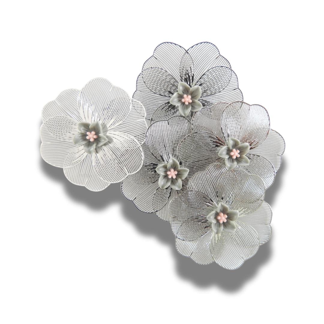 Oversized 40 mm flower button with silver petals, grey and pink floral center, shank back. Lightweight and perfect for sewing or crafts