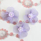 Set of 3 handmade flower buttons with purple petals and pearl centers. Lightweight and perfect for crafts, accessories, and summer decor.