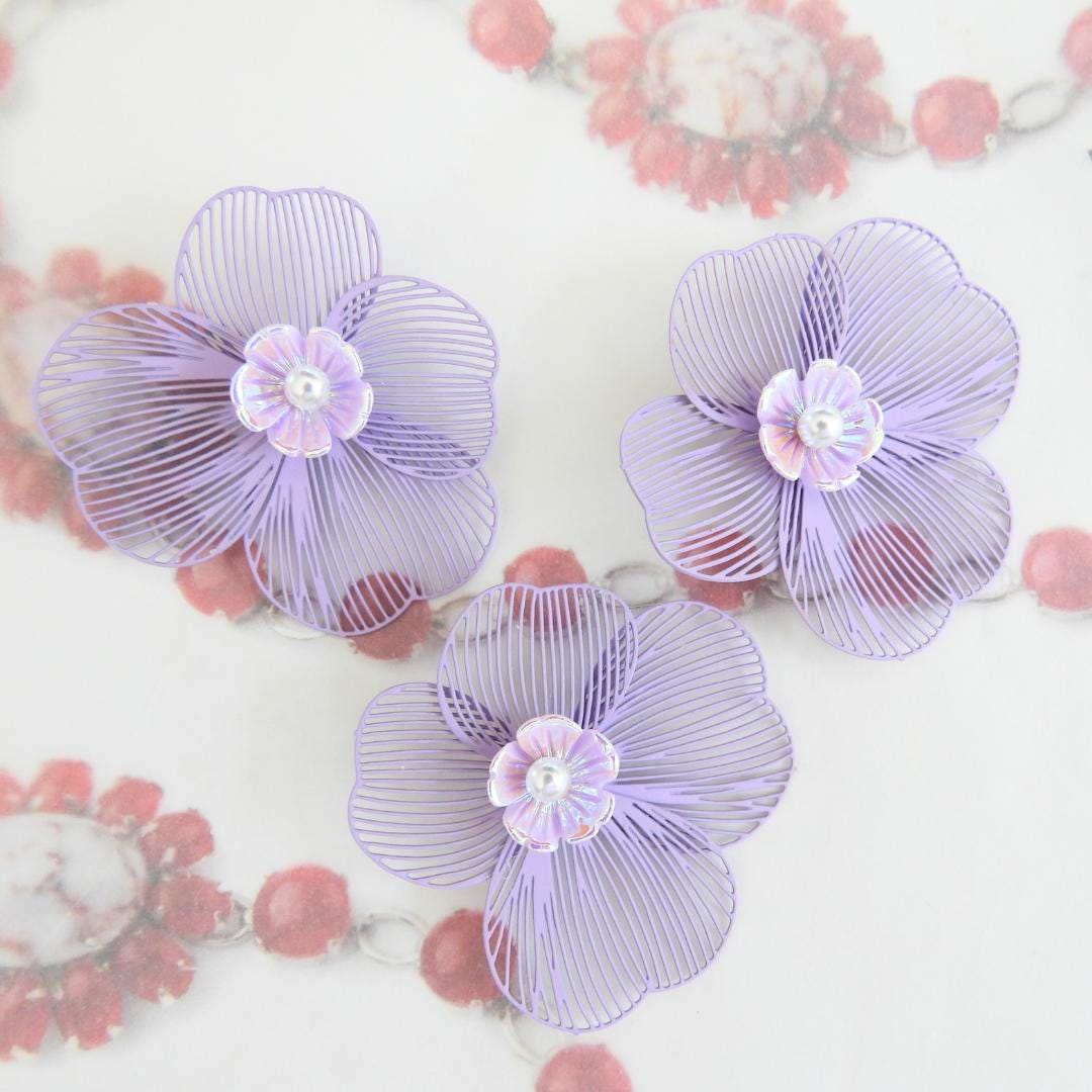 Set of 3 handmade flower buttons with purple petals and pearl centers. Lightweight and perfect for crafts, accessories, and summer decor.