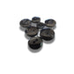 Set of 7 antique Victorian black glass buttons for sewing - 2-hole, 8–15 mm, Czech molded glass. Glossy floral & geometric patterns