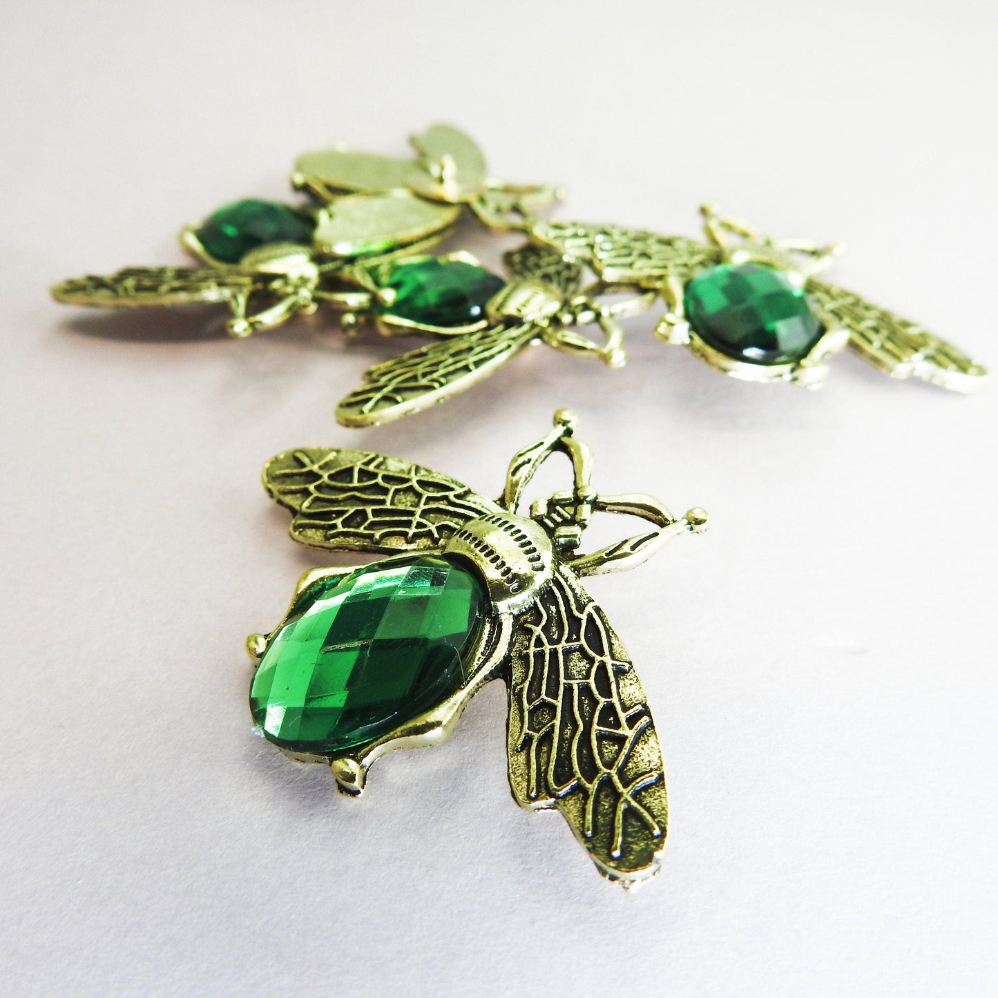 Large green rhinestone bee buttons