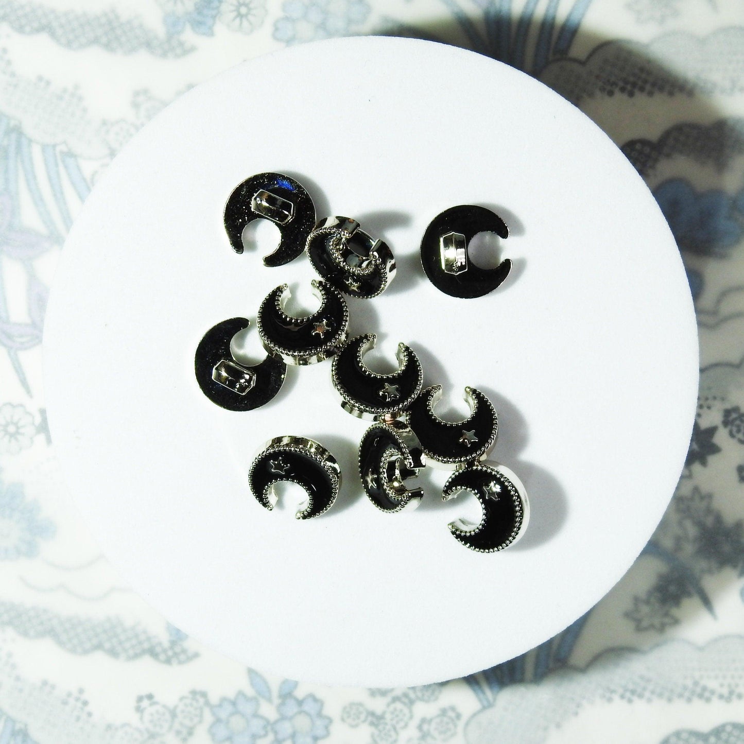 Moon-shaped buttons