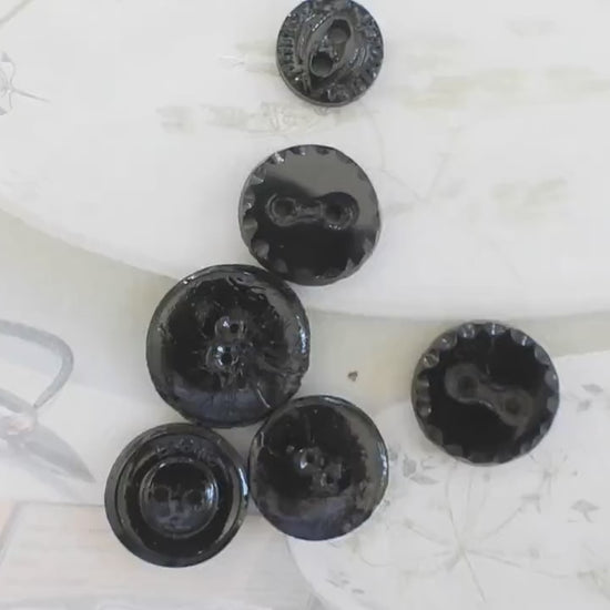 Set of 7 antique Victorian black glass buttons for sewing - 2-hole