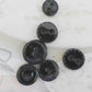 Set of 7 antique Victorian black glass buttons for sewing - 2-hole