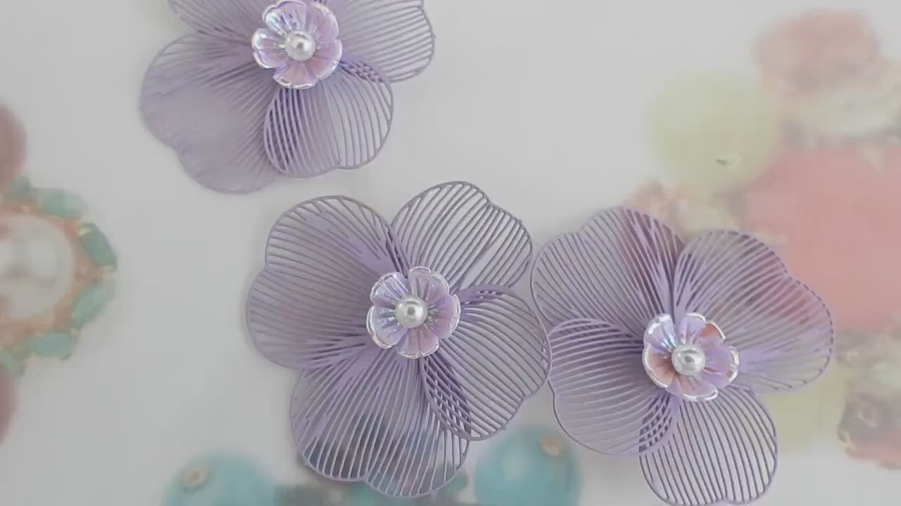 Set of 3 handmade flower buttons with purple petals and pearl centers. Lightweight and perfect for crafts