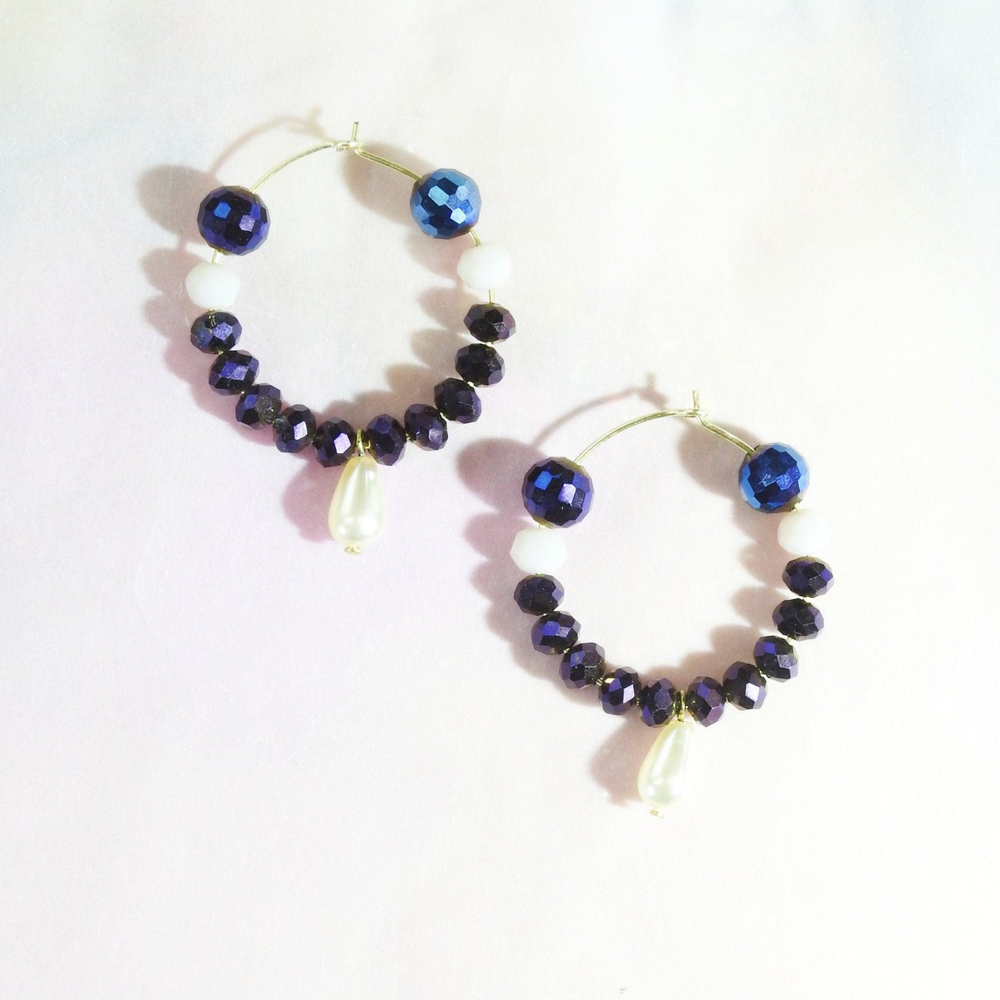 Purple glass bead earrings hoop with eye-catching dark blue, aubergine colored, and white faceted Austria glass beads. 30 mm