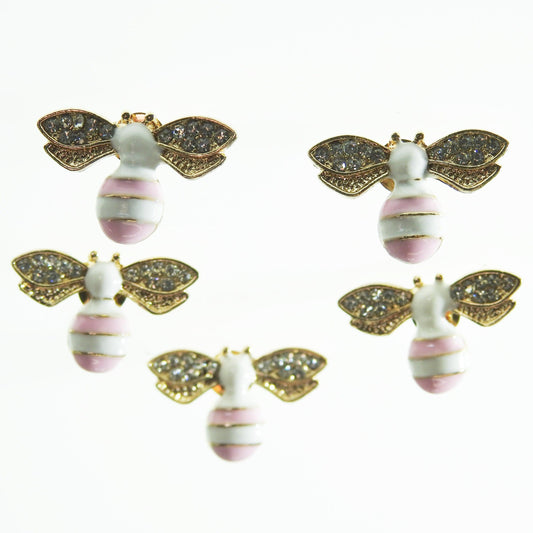 Tiny pink bee buttons