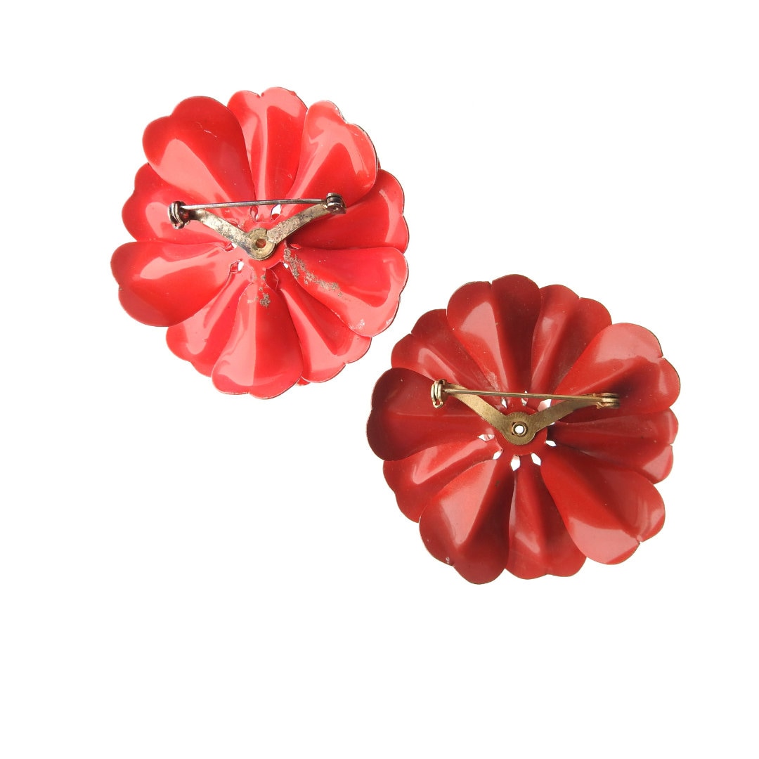 Red vintage metal flower brooches for women. Set of two antique enamel floral pins. 50s 60s style Christmas gift ideas for wife or mother.