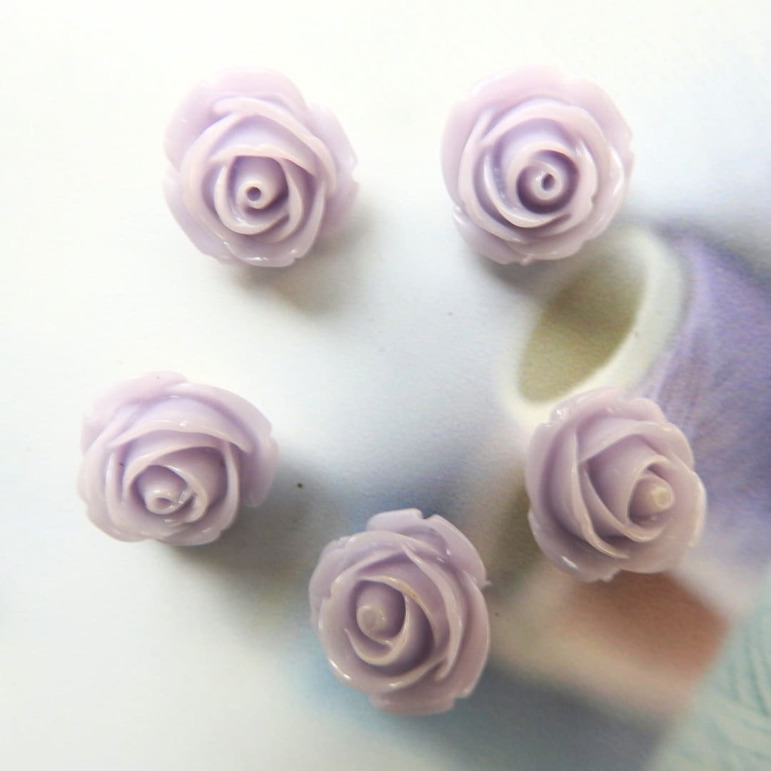 Purple flower-shaped buttons for sewing and jewelry. Embellishments hair accessories, drapery tiebacks, wedding decor, shoes, handbag, shirt