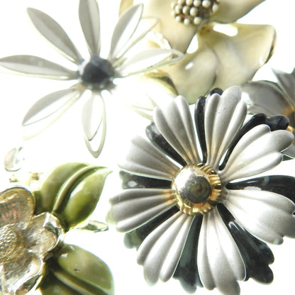 Vintage flower brooches and pins collection with a nice winter and fall colors palette.